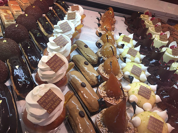 Many delicious pastries in a shop in France