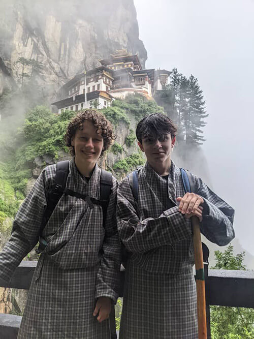 Owen and Archie hiking to Paro Taktsang (elev 3,120m) in Bhutan.