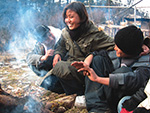 Women volunteering with family in Bhutan.