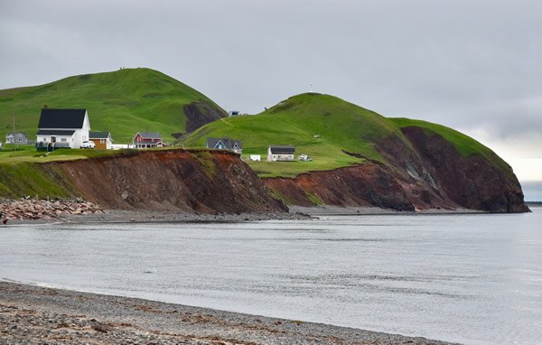 Magdalen islands houses and cliffs.