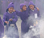 Semana Santa in Guatemala. Boys with incense at Easter.