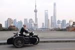 Traveling by motorcycle in Shanghai, China.