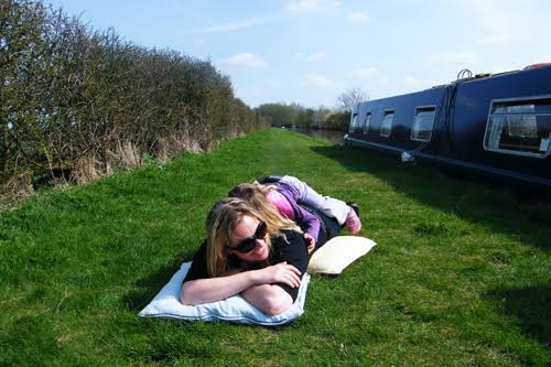 The author hanging out next to her narrow boat in the UK.