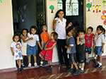American girl with children in El Salvador.