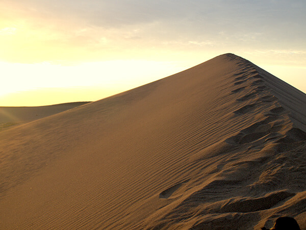 Sand dune near the Silk Road stop of Dunhuang, China.