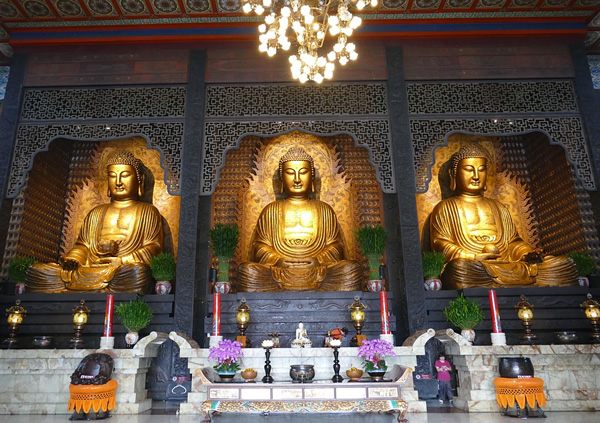 Three Buddhas in a temple in Taiwan.