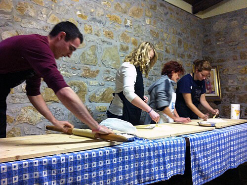Arcadia students make fresh pasta with the Orsini family