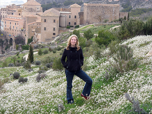Author in a field of flowers in Cuenca, Spain.