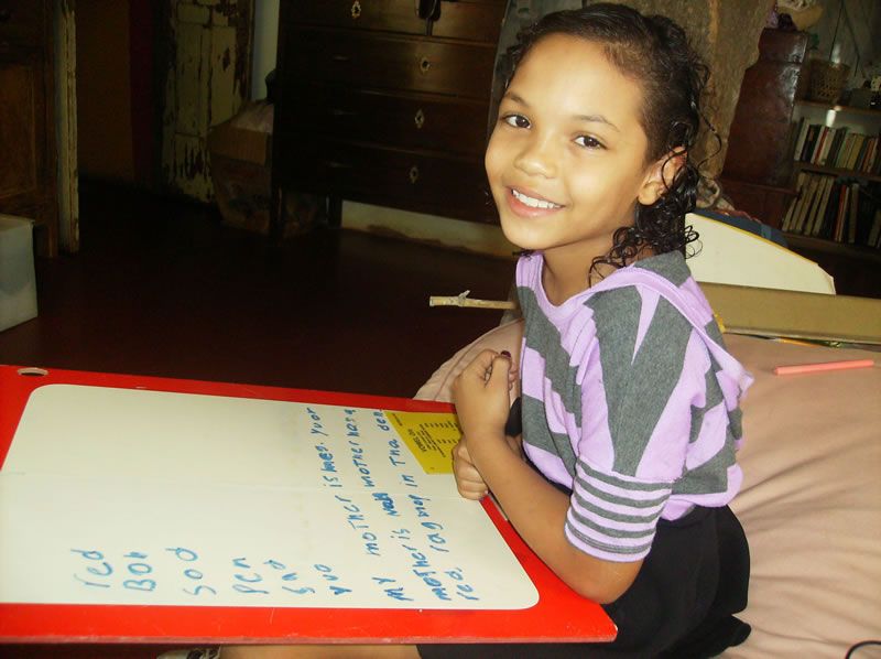 A young private student in Puerto Viejo, Costa Rica learning English