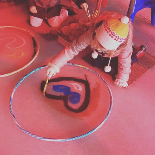 Ice painting with a teacher and his daughters.