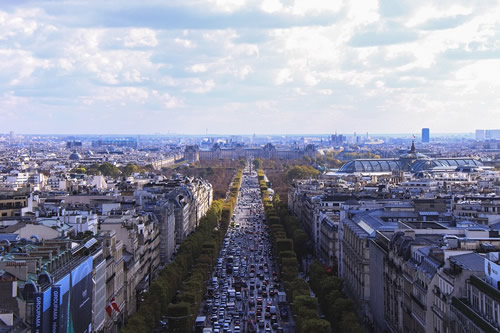 Panorama of a busy commercial boulevard in Paris.