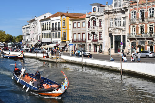 Cruising the canals of Aveiro in 'barcos moliceiros'