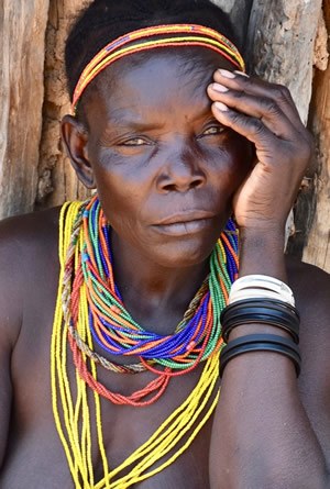Mucubal woman with the traditional ompota headdress in South Angola