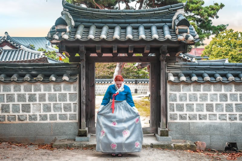 Author in a hanbok, a traditional dress, while living in South Korea
