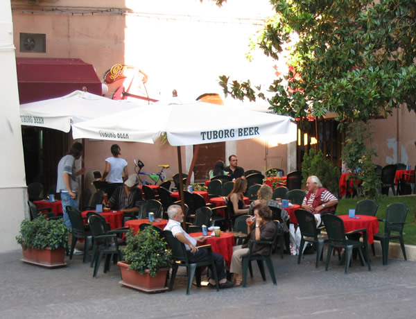 Speaking with Italians in Italy at an outdoor cafe