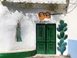 House with guitar above door: Teaching in Spain as an Assistant.