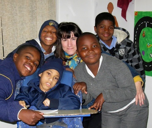 Teacher with students in South Africa