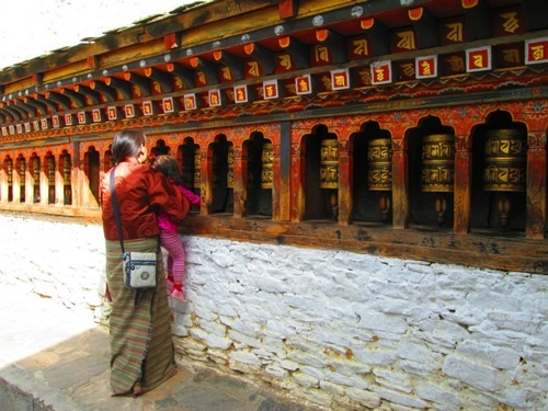 At a prayer wheel in Bhutan
