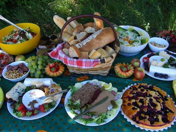 A huge office picnic laid out in France.