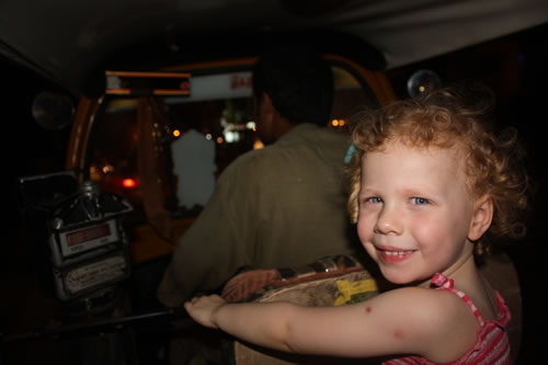 My three-year-old is in the back of an auto-rickshaw.