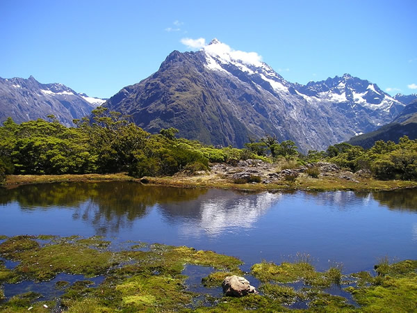 New Zealand Lake Wanaka hike in snow-capped mountains.