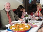 Enjoying paella in Spain