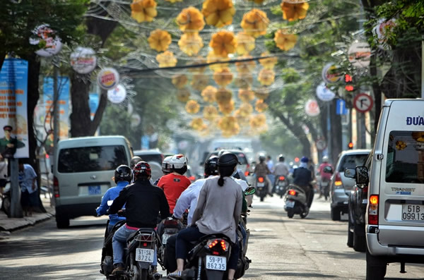 A street scene with motorbikes in Ho Chi Minh City, Vietnam.