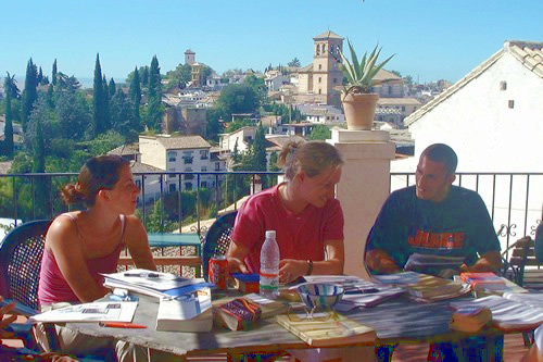 Students studying Spanish on terrace of Carmen de las Cuevas in the South of Spain.