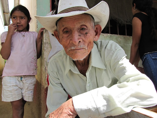Older man and young girl in Honduras.