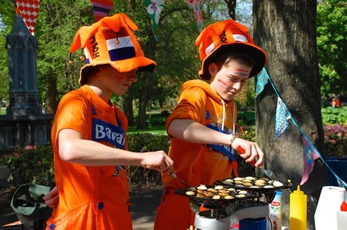 Children baking pancakes