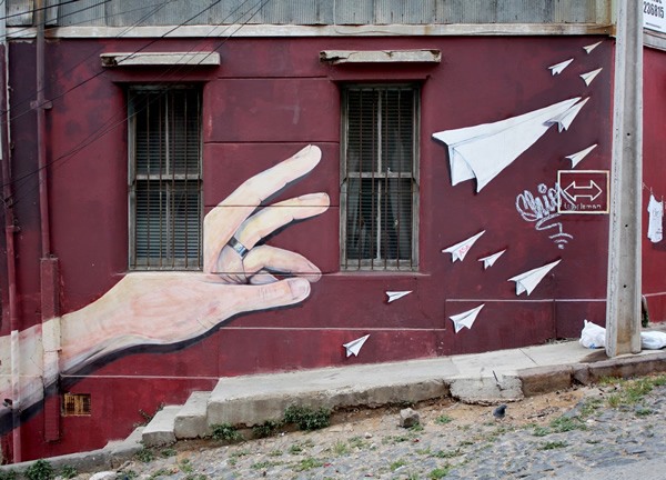 A trompe l'oeil mural adorns a building on Templeman Street in Valparaiso, Chile
