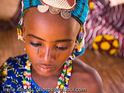 Fulani girl prepares to go to the market.