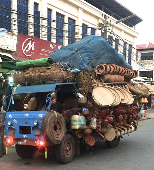 Vendors' vehicles packed to the brim in Cambodia's cities