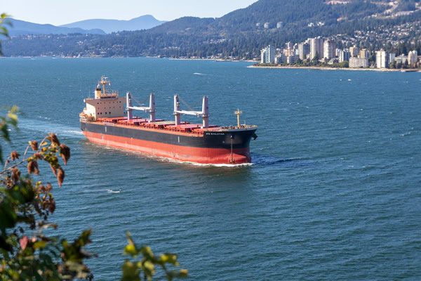 Cargo ship travel by Vancouver 
