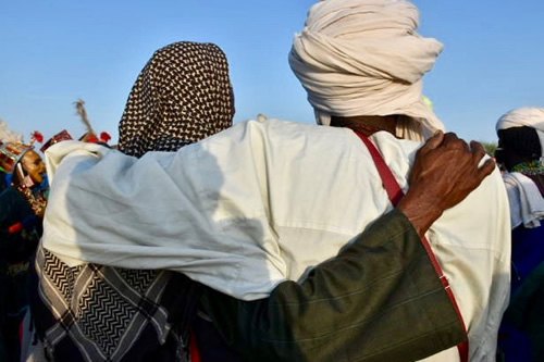 A show of male bonding, a common sight among the Wodaabe