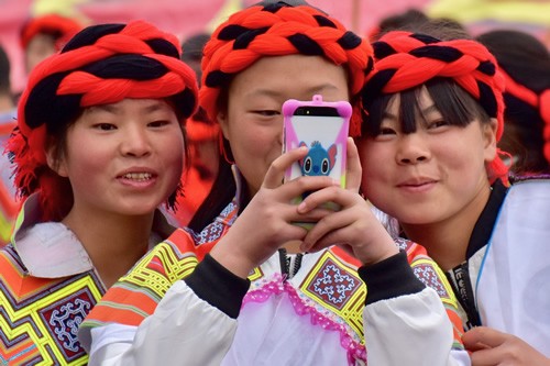 Miao women enjoying the festival in Nankai village.