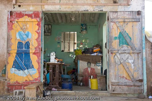 Colorful wall paintings on house.