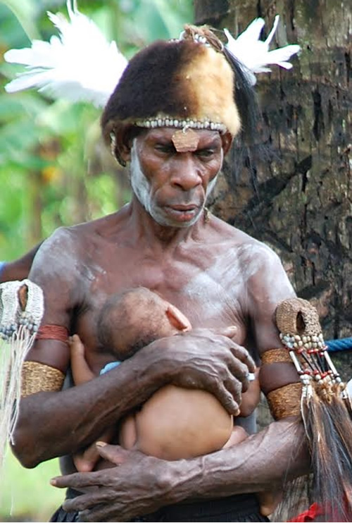 Man holding infant