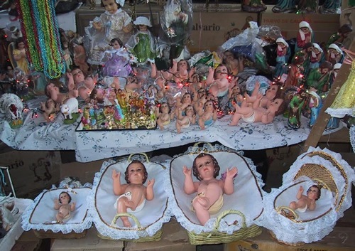 Figures of the baby Jesus at the market