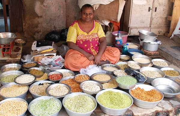 Woman selling pulses at Mumbai, India market