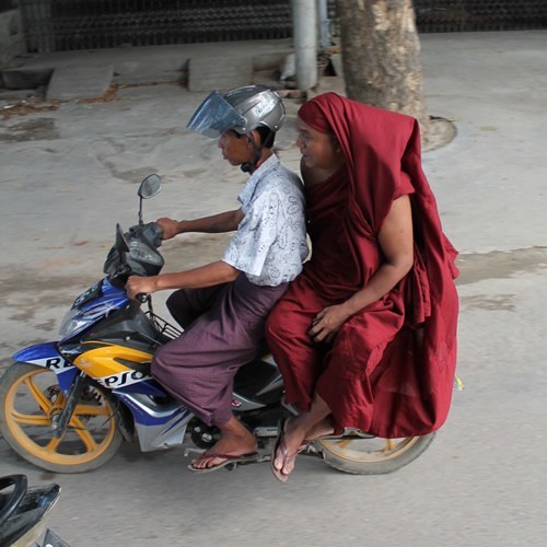 Monk on a motorbike in Myanmar