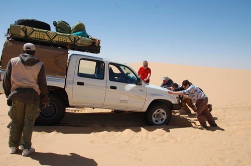 Car stuck in desert sand