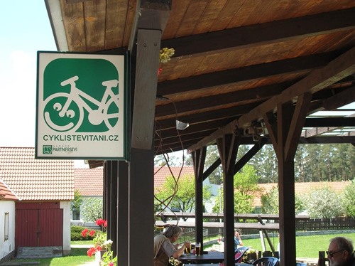 Side for cyclists outside a restaurant.