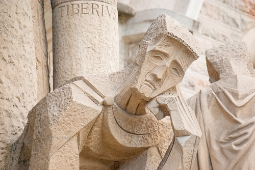 A statue on the facade of La Sagrada Familia.
