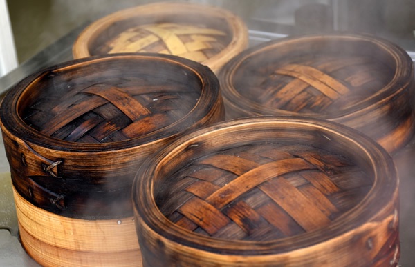 bamboo steamer basket with dumplings, xiaolongbao