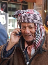 Man in Sfax Medina with cellphone