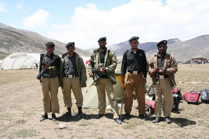 The Pakistani military guards our tent.