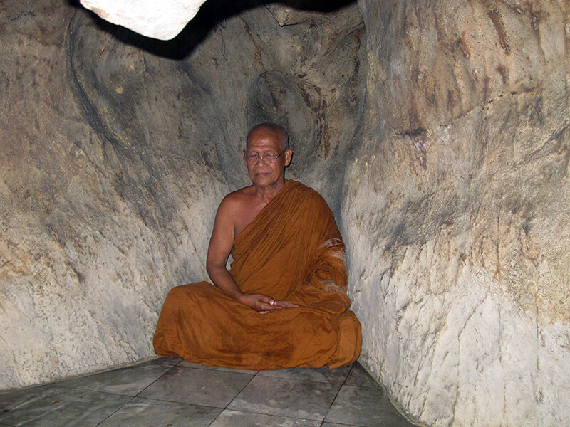 Monk in the cave in Thailand.