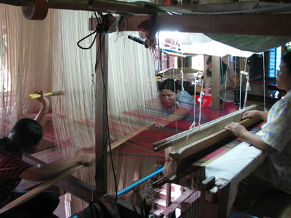 Silk weaving looms in Thailand.