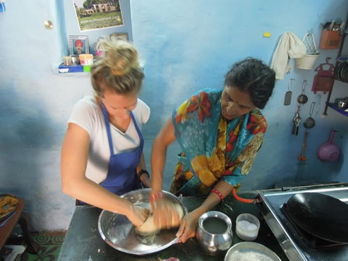 Folding pakora with Sashi at her cooking school in India